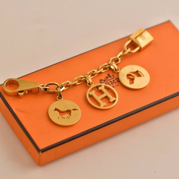 Hermes Accessories - Hermès Gold Purse Charm Or Keychain. 5.5" Goldtone